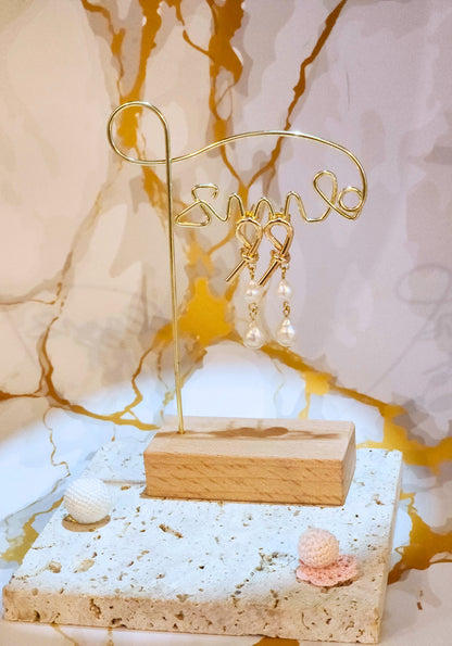 Chandelier earrings featuring selectively curated 7-9mm Aurora-grade teardrop-shaped pearls. Styled with 18K gold-plated studs & S925 needles. 