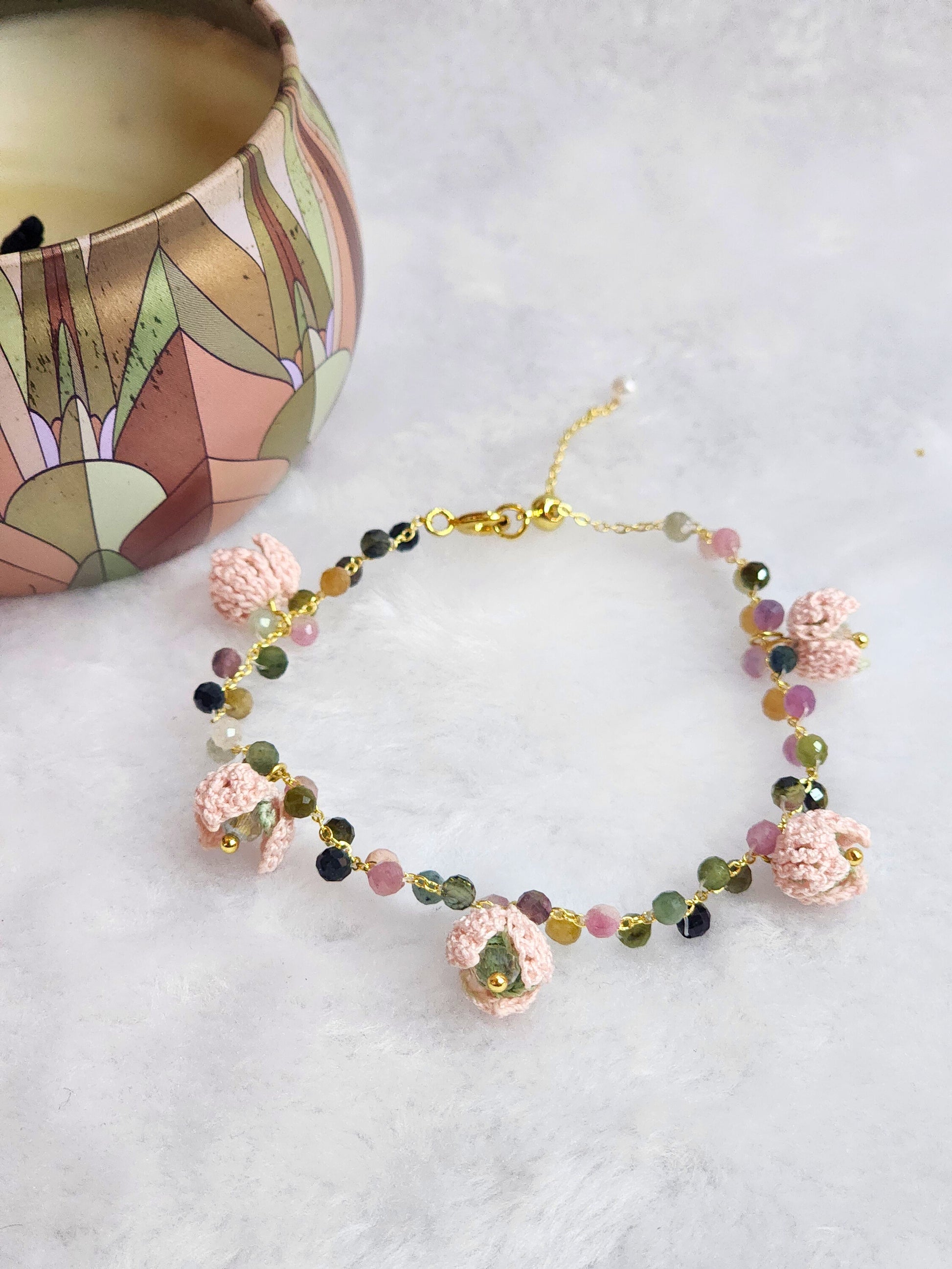 Natural Tourmaline Crystal bracelet with pink snowdrops, crowned with sparkling Czech crystals. On 14K gold-plated bracelet with extension chain.