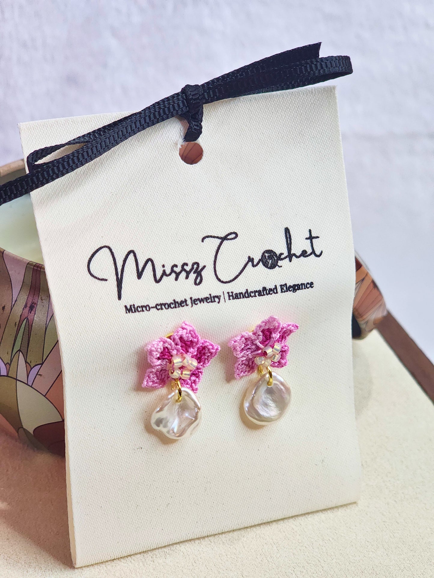 Natural high-luster Petal Keshi Pearl earrings with pink handcrafted micro-crochet peach blossoms on 18K gold-plated studs